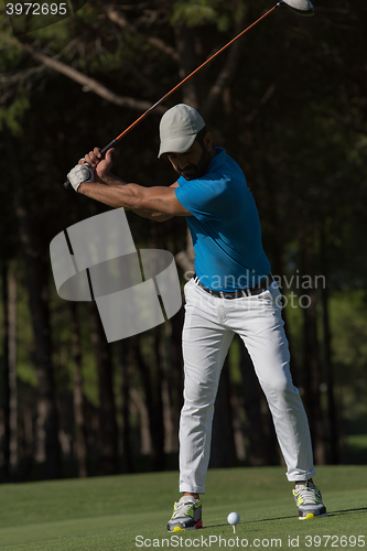 Image of golf player hitting shot