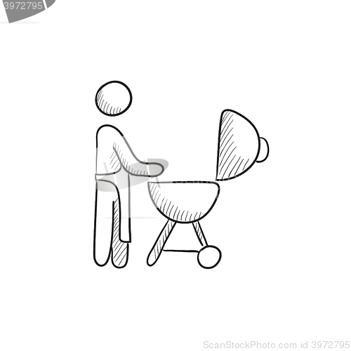 Image of Man at barbecue grill sketch icon.