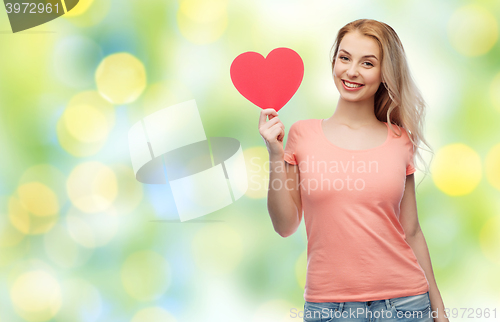 Image of happy woman or teen girl with red heart shape