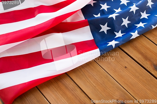 Image of close up of american flag on wooden boards