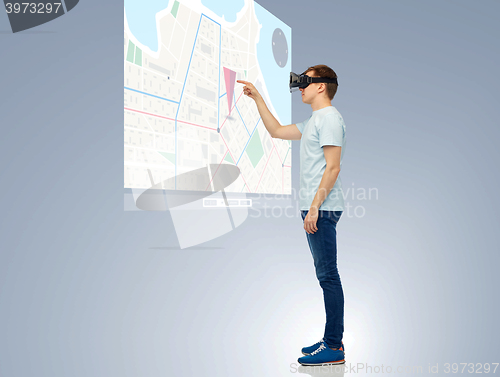 Image of happy man in virtual reality headset or 3d glasses