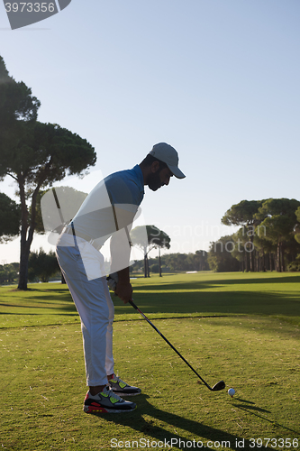 Image of golf player hitting shot