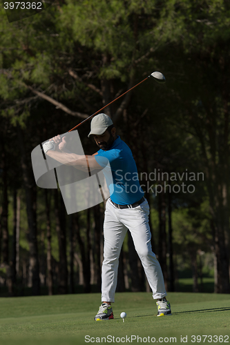 Image of golf player hitting shot
