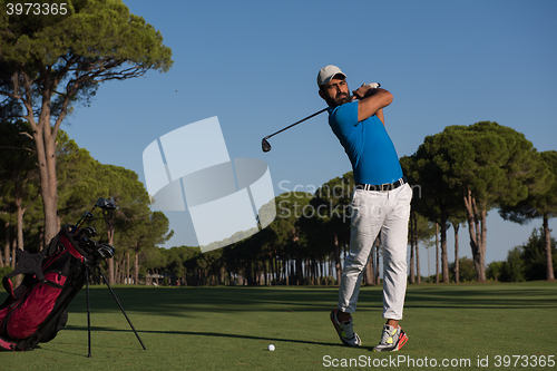 Image of golf player hitting shot