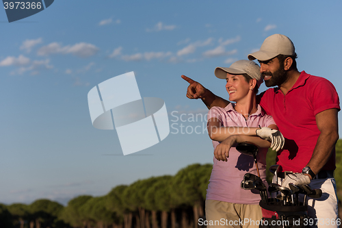 Image of portrait of couple on golf course