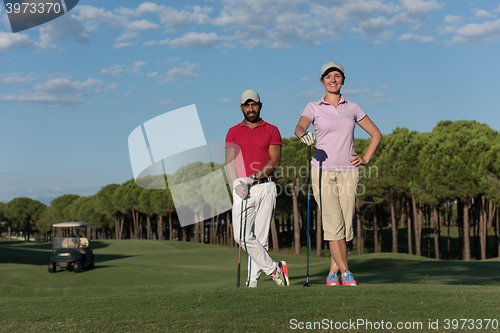 Image of portrait of couple on golf course