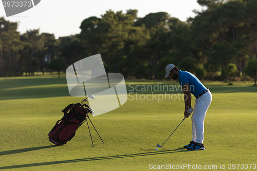 Image of golfer hitting long shot