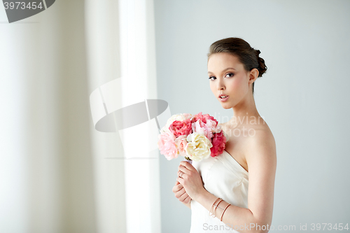 Image of beautiful asian woman with flower and jewelry