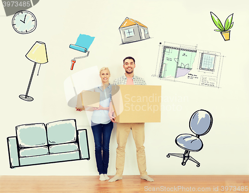 Image of couple with cardboard boxes moving to new home