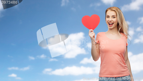 Image of happy woman or teen girl with red heart shape