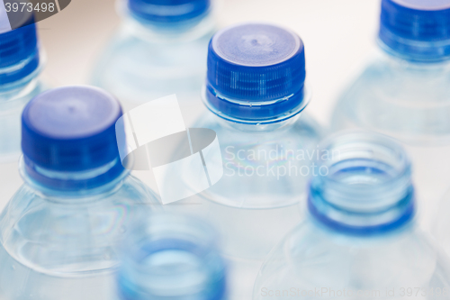 Image of close up of plastic bottles with drinking water