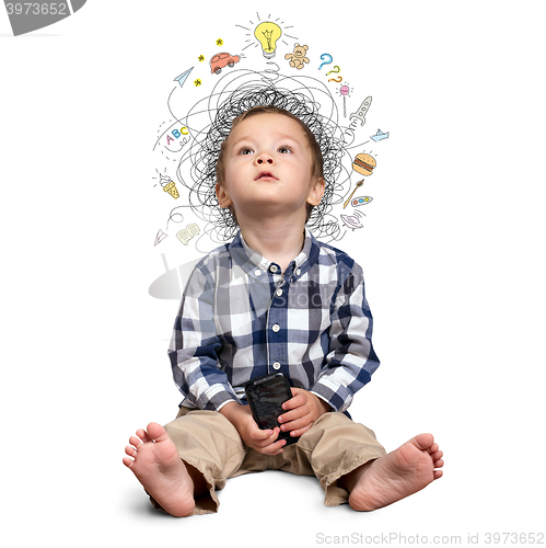 Image of Little boy thinking