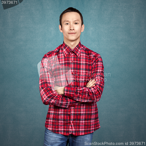 Image of Asian Man With Folded Hands