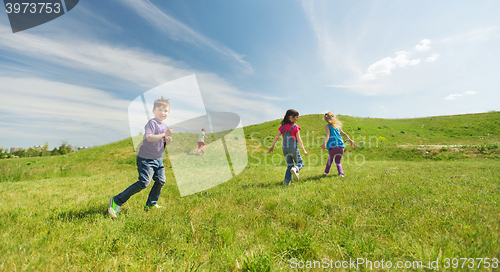 Image of group of happy kids running outdoors