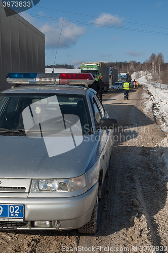 Image of Trucks stopped on highway after heavy snow storm