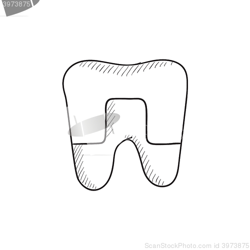 Image of Crowned tooth sketch icon.