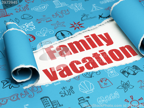 Image of Travel concept: red text Family Vacation under the piece of  torn paper