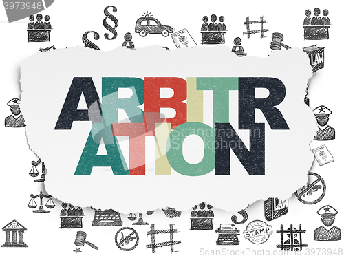 Image of Law concept: Arbitration on Torn Paper background