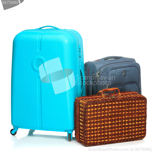 Image of The modern and retro suitcases on white background