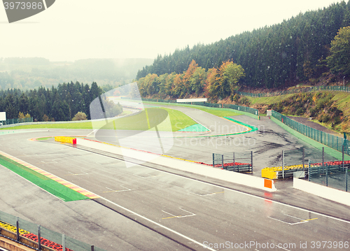 Image of close up of race track or road and snow