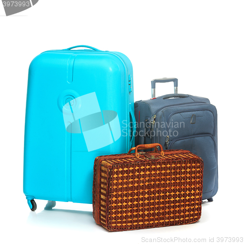 Image of The modern and retro suitcases on white background