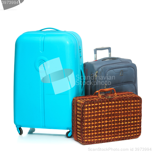 Image of The modern and retro suitcases on white background