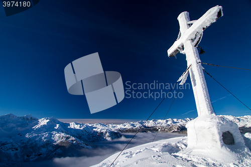 Image of Cross on Vogel in slovenian Alps.