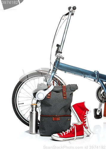 Image of The new modern bicycle and suitcase, sneakers, thermos