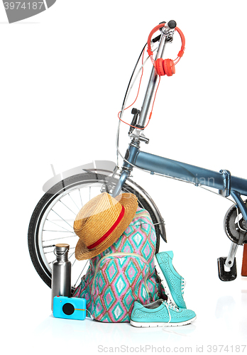 Image of The new modern bicycle and suitcase, sneakers, thermos