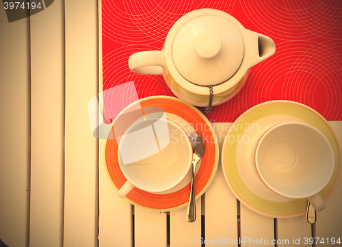 Image of two teacups and teapot