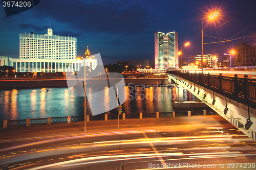 Image of Moscow, Russia. Night cityscape with Kalinin bridge and Moscow r