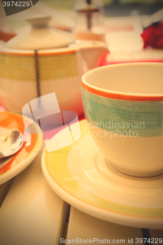 Image of cup of tea and teapot
