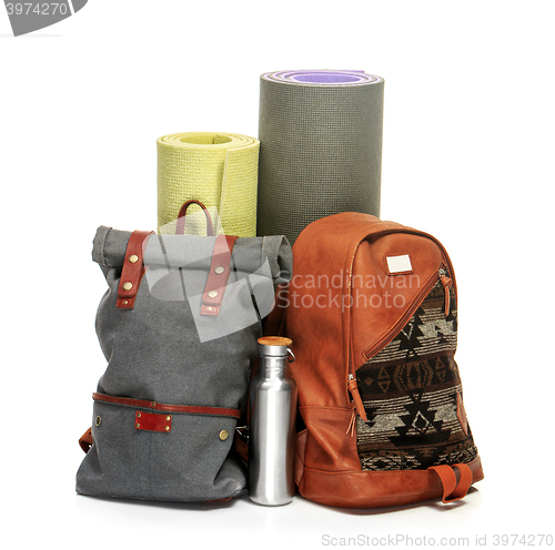 Image of The suitcases, karrimats on white background.