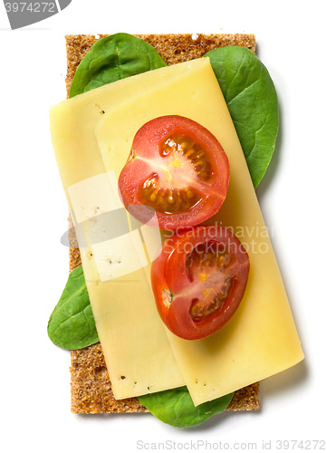 Image of crispbread with cheese and tomato