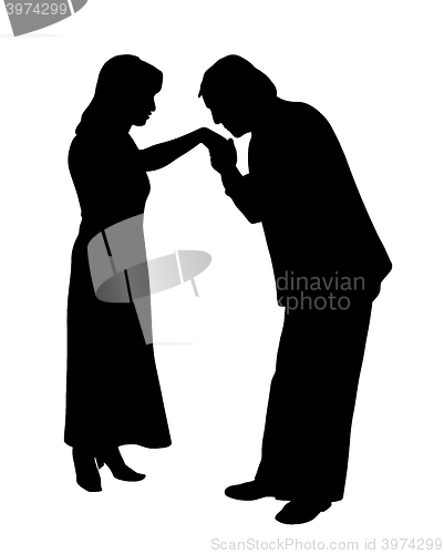 Image of Man kissing woman's hand