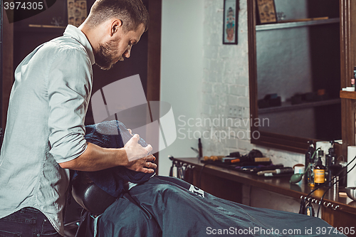 Image of Hipster client visiting barber shop