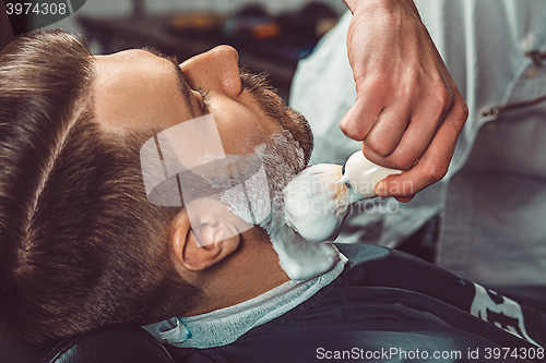 Image of Hipster client visiting barber shop