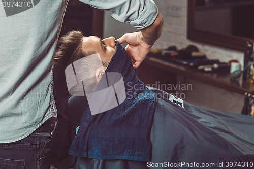 Image of Hipster client visiting barber shop