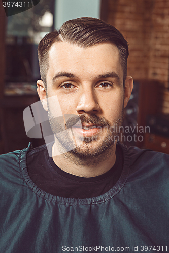 Image of The young man looking at camera