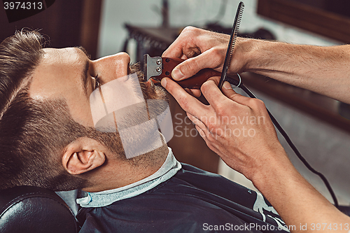 Image of Hipster client visiting barber shop