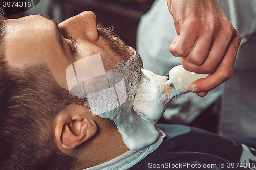 Image of Hipster client visiting barber shop