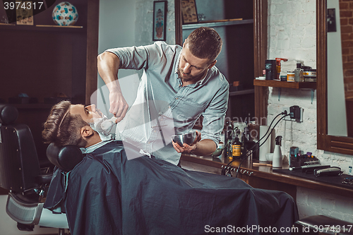 Image of Hipster client visiting barber shop