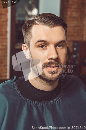 Image of The young man looking at camera