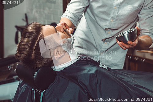 Image of Hipster client visiting barber shop