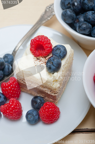 Image of fresh raspberry and blueberry cake