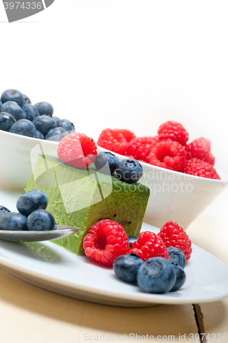 Image of green tea matcha mousse cake with berries