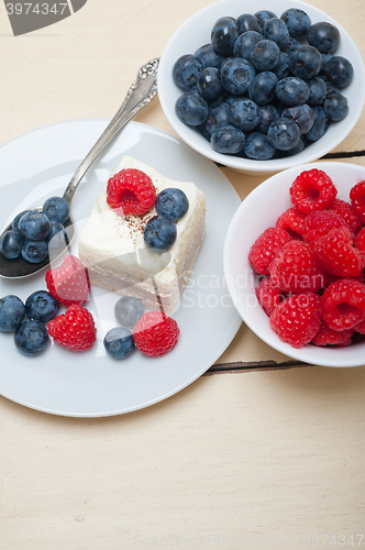 Image of fresh raspberry and blueberry cake