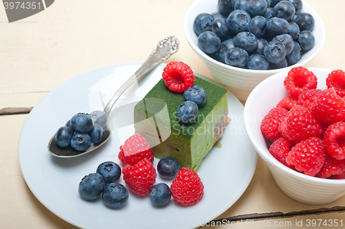 Image of green tea matcha mousse cake with berries