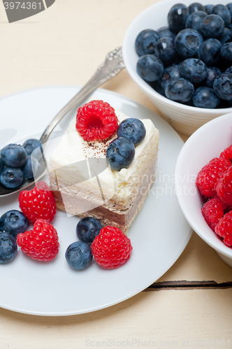 Image of fresh raspberry and blueberry cake