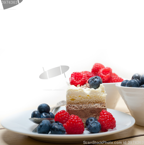 Image of fresh raspberry and blueberry cake